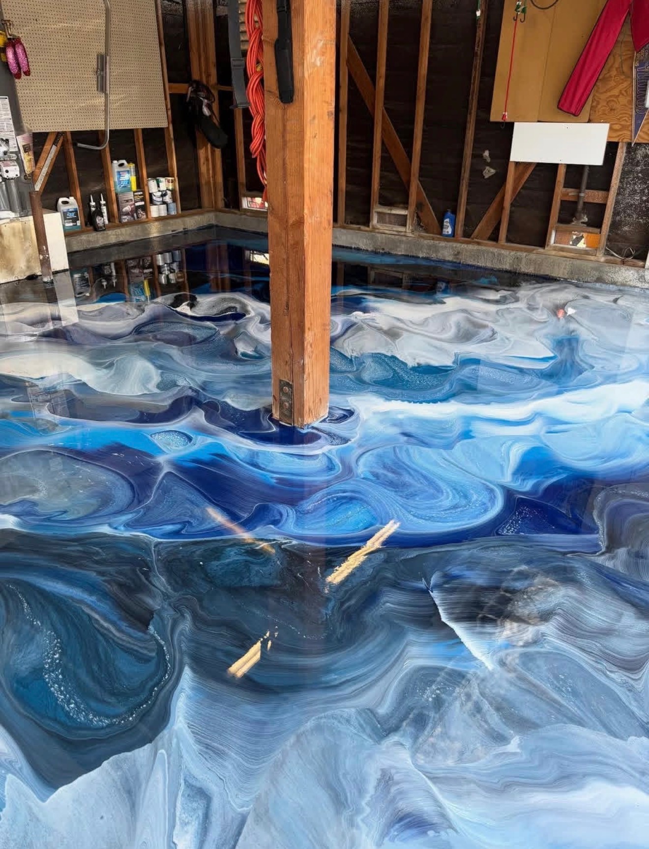 Blue, white and charcoal metallic epoxy installation