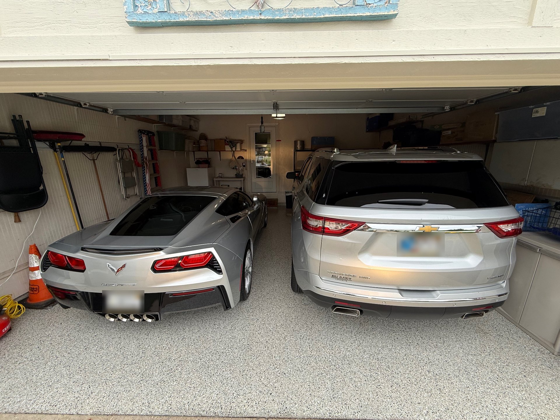 Finished flake epoxy garage floor after coating, seen from the driveway